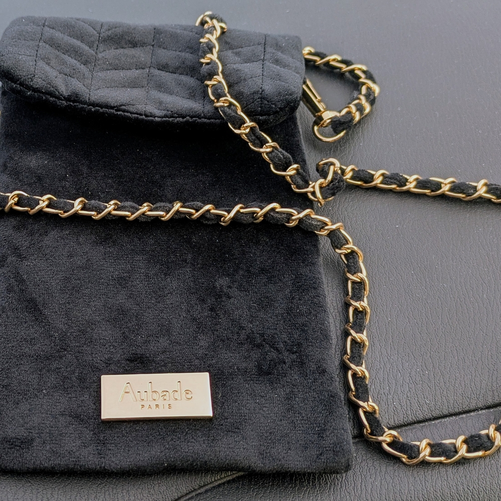 Luxurious Black and Gold Crossbody Bag with Chain